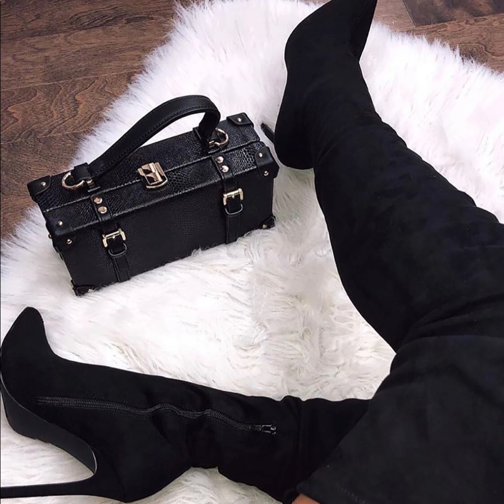 Black thigh high heel boots